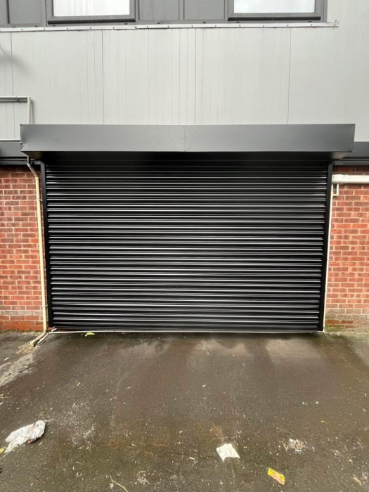 9 Roller Shutter Refurbishment & Professional Spray Coating — Leeds, West Yorkshire